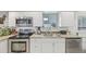 Updated kitchen featuring stainless steel appliances and stylish countertops at 4152 S Vrain St, Denver, CO 80236
