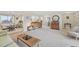 Cozy living room featuring a decorative cabinet, vintage furniture, and soft carpet at 4152 S Vrain St, Denver, CO 80236
