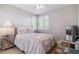Charming bedroom featuring neutral decor and lots of natural light at 6590 S Tabor St, Littleton, CO 80127