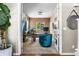 Stylish home office featuring wood accent walls, a modern desk, and comfortable seating at 14110 Pastel Ln, Parker, CO 80134