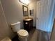 Well-lit bathroom with modern sink, vanity, and vinyl flooring at 2575 S Syracuse Way # M108, Denver, CO 80231