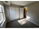 Bedroom with natural light and closet at 2575 S Syracuse Way # M108, Denver, CO 80231