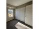Bedroom with natural light and closet at 2575 S Syracuse Way # M108, Denver, CO 80231