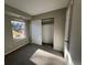 Bedroom with natural light and closet at 2575 S Syracuse Way # M108, Denver, CO 80231