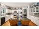 Spacious kitchen with modern appliances, an island, and ample cabinet space at 5491 S Youngfield W Ct, Littleton, CO 80127