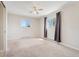 This bedroom is bright and spacious and features two windows at 640 S Quivas St, Denver, CO 80223