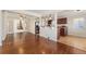 Inviting living room with open layout, hardwood floors, and access to the kitchen at 640 S Quivas St, Denver, CO 80223