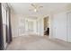 Bright main bedroom featuring double doors to the living area and ensuite bathroom at 640 S Quivas St, Denver, CO 80223