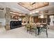 Spacious finished basement featuring a wet bar, dining area, and fireplace at 1105 Northwood Ln, Castle Rock, CO 80108