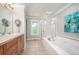 Luxurious main bathroom with soaking tub and separate shower at 2746 Geneva St, Denver, CO 80238