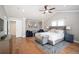 Spacious main bedroom with vaulted ceiling and sitting area at 2746 Geneva St, Denver, CO 80238