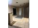 Bright dining room with tile flooring, stainless steel appliances, and sliding glass door at 325 N 7Th Ave, Brighton, CO 80601