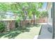 Artificial turf backyard with privacy fencing, offering a low-maintenance and private outdoor space at 19249 E Progress Ave, Centennial, CO 80015