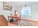 Cozy home office with natural light, a desk, and a comfortable chair at 19249 E Progress Ave, Centennial, CO 80015