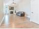 Bright living room features hardwood floors, vaulted ceilings and a cozy fireplace at 19249 E Progress Ave, Centennial, CO 80015