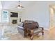 Cozy living room with a fireplace, vaulted ceiling, and natural light at 19249 E Progress Ave, Centennial, CO 80015