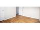 Hardwood floors complement the spacious bedroom, offering a flexible living space at 2856 Jasmine St, Denver, CO 80207