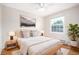 Serene bedroom with a plush bed, natural light, and contemporary decor, offering a peaceful retreat at 2856 Jasmine St, Denver, CO 80207