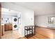 Apartment layout with hardwood floors flowing into the kitchen, featuring washer and dryer hookups at 2856 Jasmine St, Denver, CO 80207