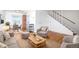 Inviting living room featuring hardwood floors, comfortable seating, and abundant natural light, creating a cozy atmosphere at 2856 Jasmine St, Denver, CO 80207