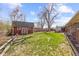 Wide backyard view with red shed at 5432 E Bails Dr, Denver, CO 80222