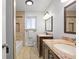 Bathroom with double vanity, shower and tub at 5432 E Bails Dr, Denver, CO 80222