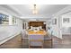 Open floor plan with hardwood floors, leading to kitchen and living area at 5432 E Bails Dr, Denver, CO 80222