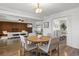 Open concept living space featuring dining area, living room and built-in desk at 5432 E Bails Dr, Denver, CO 80222
