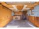 Interior of shed featuring built-in workbench, pegboard walls, and a brick furnace at 5432 E Bails Dr, Denver, CO 80222