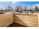 View from the balcony overlooking the neighborhood with trees in the background at 9605 E Kansas Cir # 55, Denver, CO 80247