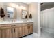 Beautiful bathroom with a dual sink vanity and a separate shower and toilet area at 9605 E Kansas Cir # 55, Denver, CO 80247