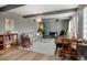 Inviting living room showcasing a gray brick wall, decorative accents, and a comfortable seating area at 9605 E Kansas Cir # 55, Denver, CO 80247