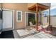 Cozy patio with a tiled floor, a seating area, and a sliding glass door entrance at 9605 E Kansas Cir # 55, Denver, CO 80247