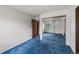 A spacious bedroom featuring mirrored closet doors and a bright, sunny window at 13890 E Marina Dr # 304, Aurora, CO 80014