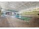 Bright indoor pool area with ample natural light, providing a year-round swimming option for residents at 13890 E Marina Dr # 304, Aurora, CO 80014