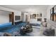 Inviting living room with stylish furniture and an open view to the kitchen at 13890 E Marina Dr # 304, Aurora, CO 80014