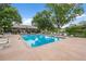 Sparkling outdoor pool surrounded by comfortable lounge chairs, perfect for enjoying sunny days and relaxation at 13890 E Marina Dr # 304, Aurora, CO 80014