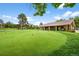 Lush putting green adjacent to a clubhouse, offering a convenient and enjoyable space for golf enthusiasts at 13890 E Marina Dr # 304, Aurora, CO 80014