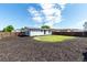 Nice backyard featuring an even lawn and mulch ground cover at 657 Locust Ave, Lochbuie, CO 80603