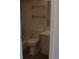 Small bathroom with tub, toilet and vanity with tile floors at 1845 N Kendall St # 316D, Lakewood, CO 80214