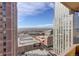 Expansive city view showcasing downtown buildings and distant mountains on a clear day at 1020 15Th St # 23L, Denver, CO 80202
