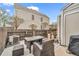 Backyard patio with wooden fence, furniture, grill and additional outside storage space at 19804 Summerset Ln, Parker, CO 80138