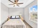 Bedroom features a ceiling fan and closet at 19804 Summerset Ln, Parker, CO 80138