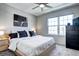 Bedroom with a large window, modern décor, and ample natural light at 19804 Summerset Ln, Parker, CO 80138