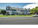 Inviting townhomes with colorful facades and lush landscaping, offering a vibrant community setting at 19804 Summerset Ln, Parker, CO 80138