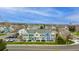 Inviting townhomes in a charming neighborhood featuring colorful facades, private entrances, and well-maintained landscaping at 19804 Summerset Ln, Parker, CO 80138