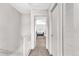 Upstairs hallway with view to the main bedroom at 19804 Summerset Ln, Parker, CO 80138