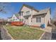 Spacious backyard with a well-maintained lawn and a charming wooden deck at 237 Cherry St, Castle Rock, CO 80104