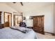 Spacious bedroom includes a seating area, closet, and neutral colored walls at 237 Cherry St, Castle Rock, CO 80104