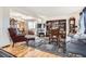 Open-concept living space with a dining area and stylish furniture at 237 Cherry St, Castle Rock, CO 80104